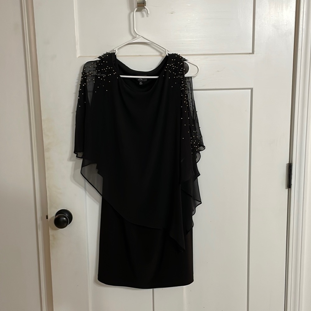 Women’s size 10 Xscape black dress with rhinestone decor on shoulders